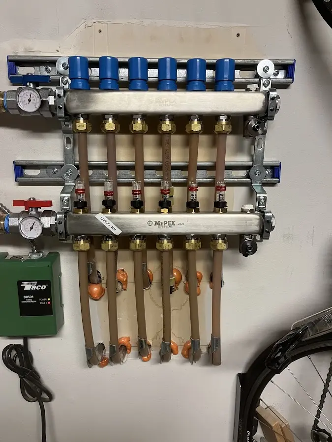 Plumber performing Gas Line Installation at a residential property in Kennett